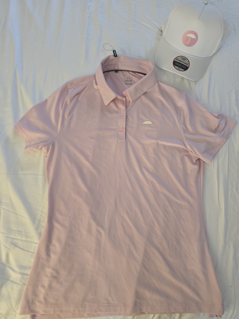 Travelers Pink Polo Women's Golf Shirt with Umbrella Logo